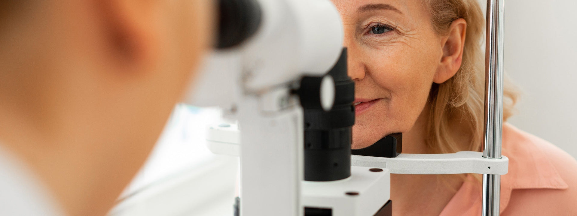 A woman receiving eye exam.