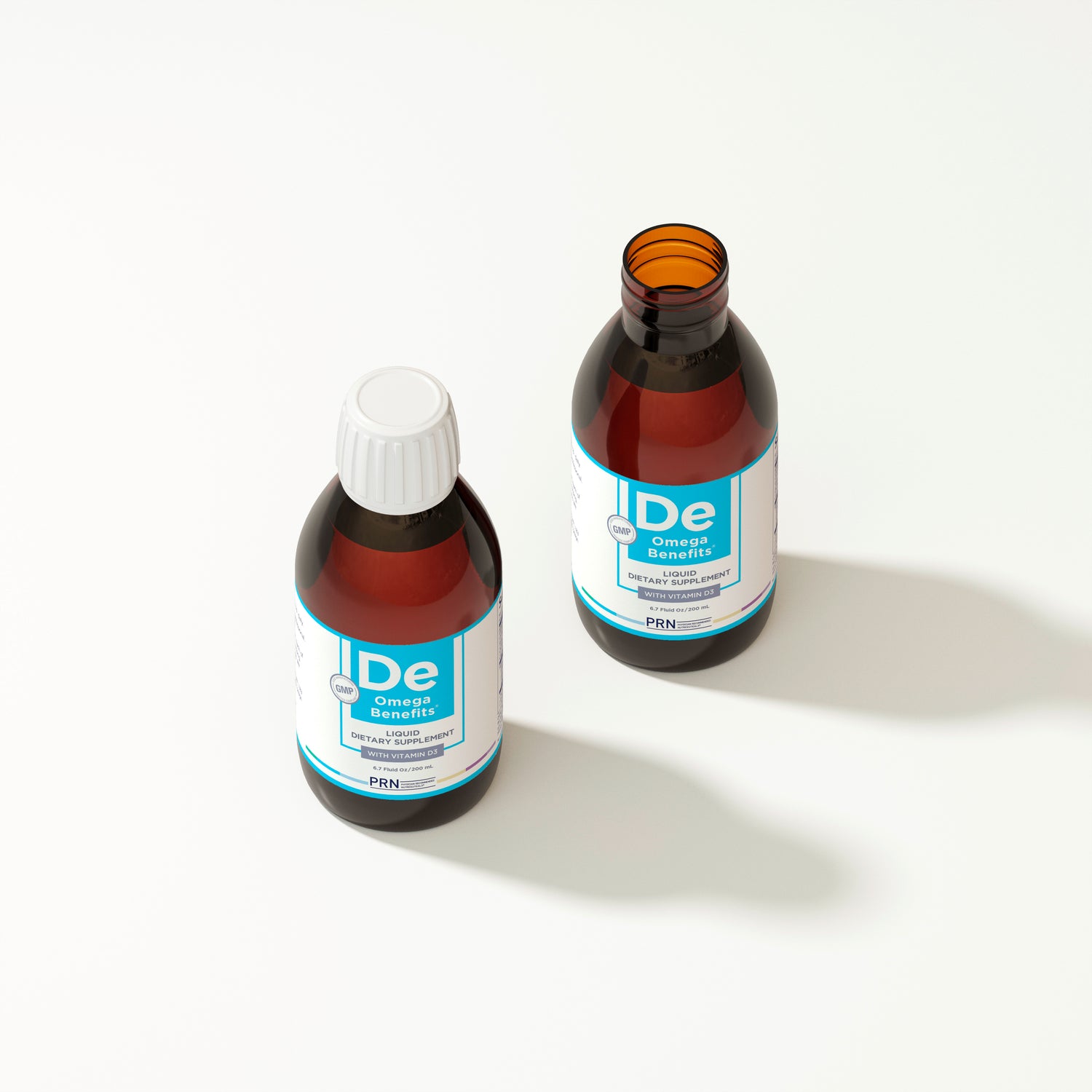 Two bottles of De3 Omega Benefits liquid on a white background
