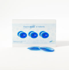 Thermoeyes XL Instants box and two heat packs on a white background