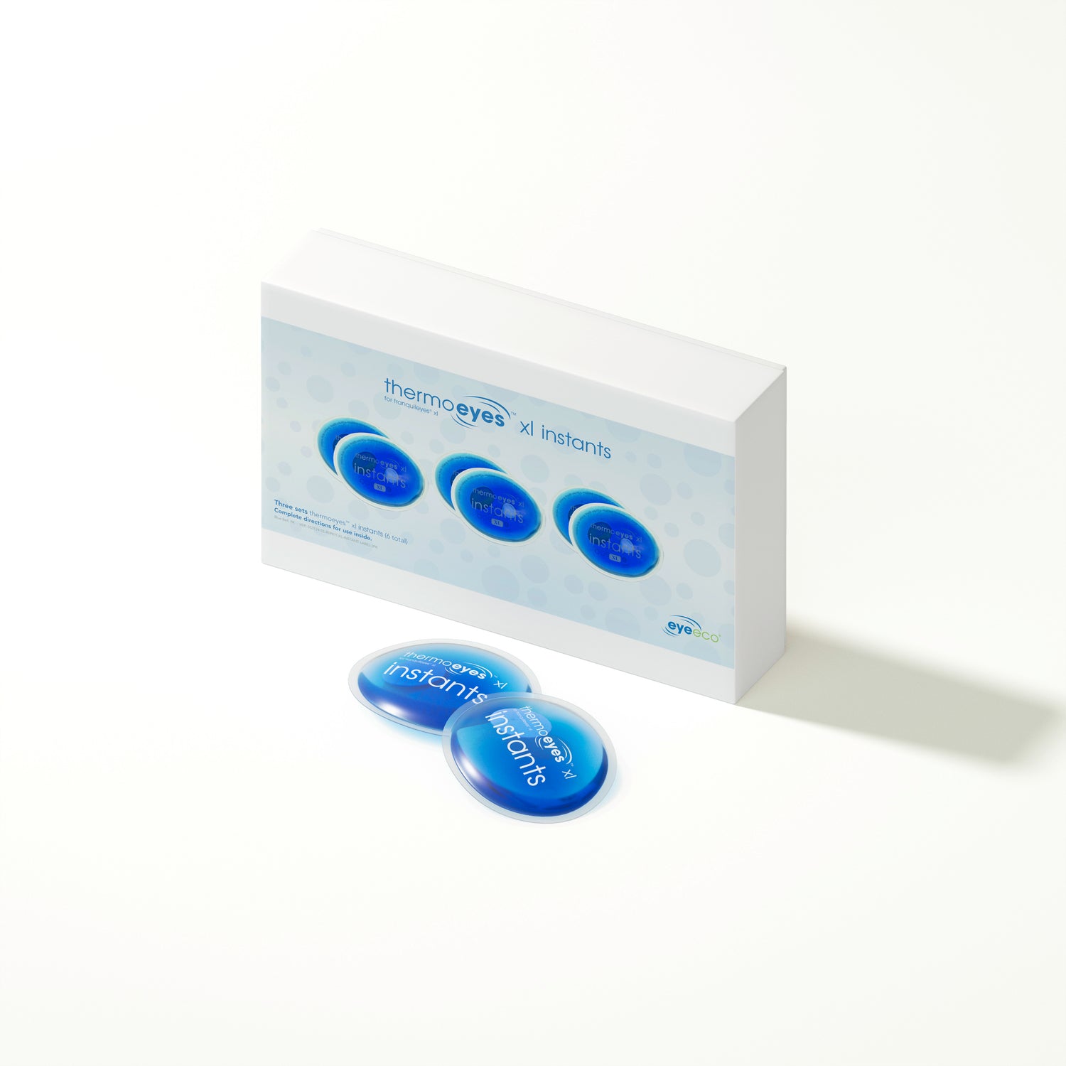 Thermoeyes XL Instants box and two heat packs on a white background